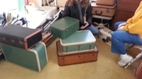 teal and brown vintage suitcases