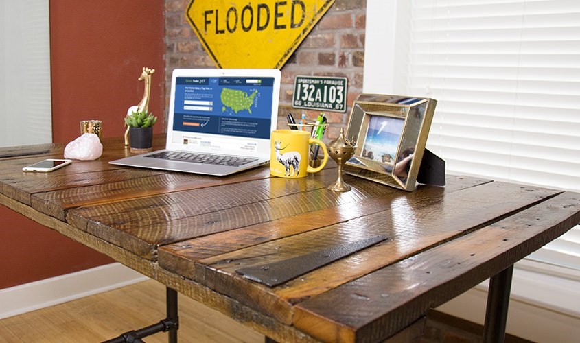 office items displayed on barn door desk