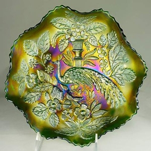 carnival glass dish with a peacock design