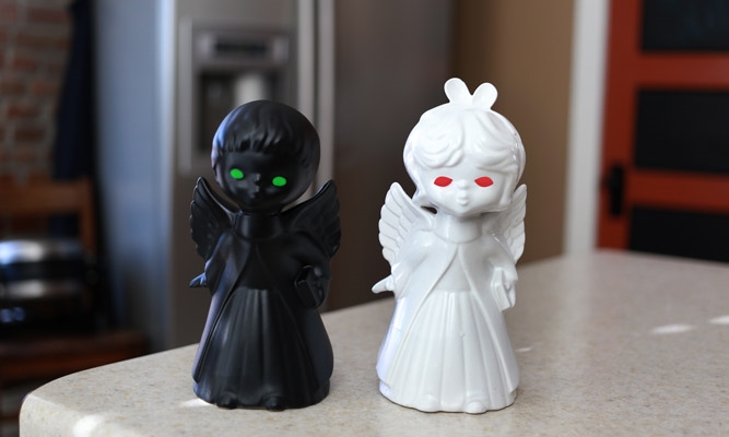 creepy painted angel figurines