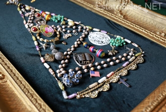 completed christmas tree made from jewelry and mounted to ornate frame