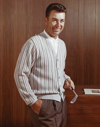 1960s man holding golf club