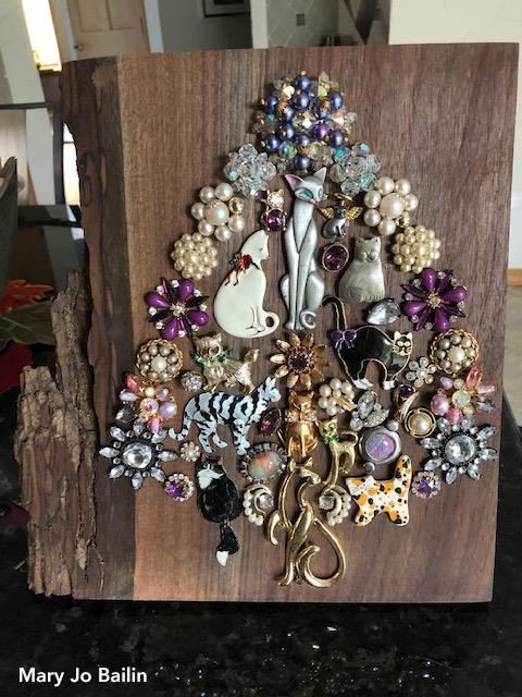 artwork made from vintage jewelry