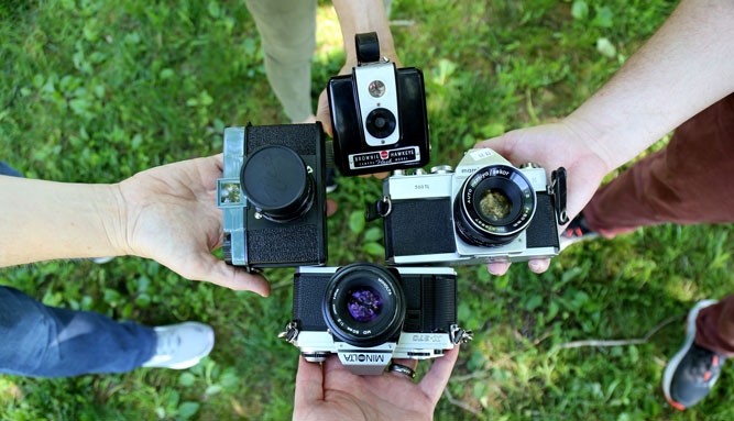 four vintage film cameras