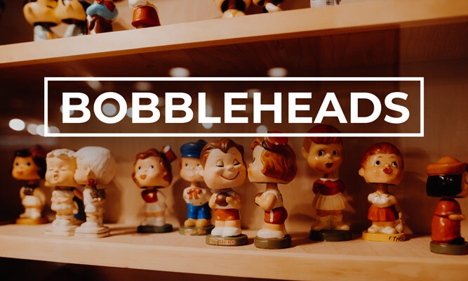 large collection of collectible bobbleheads