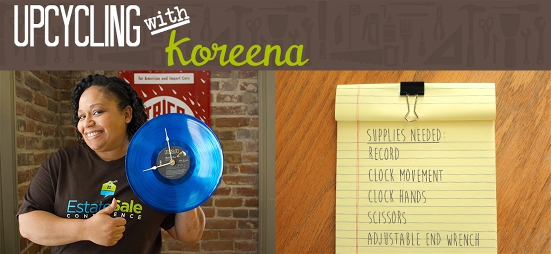 woman hold diy vinyl record clock